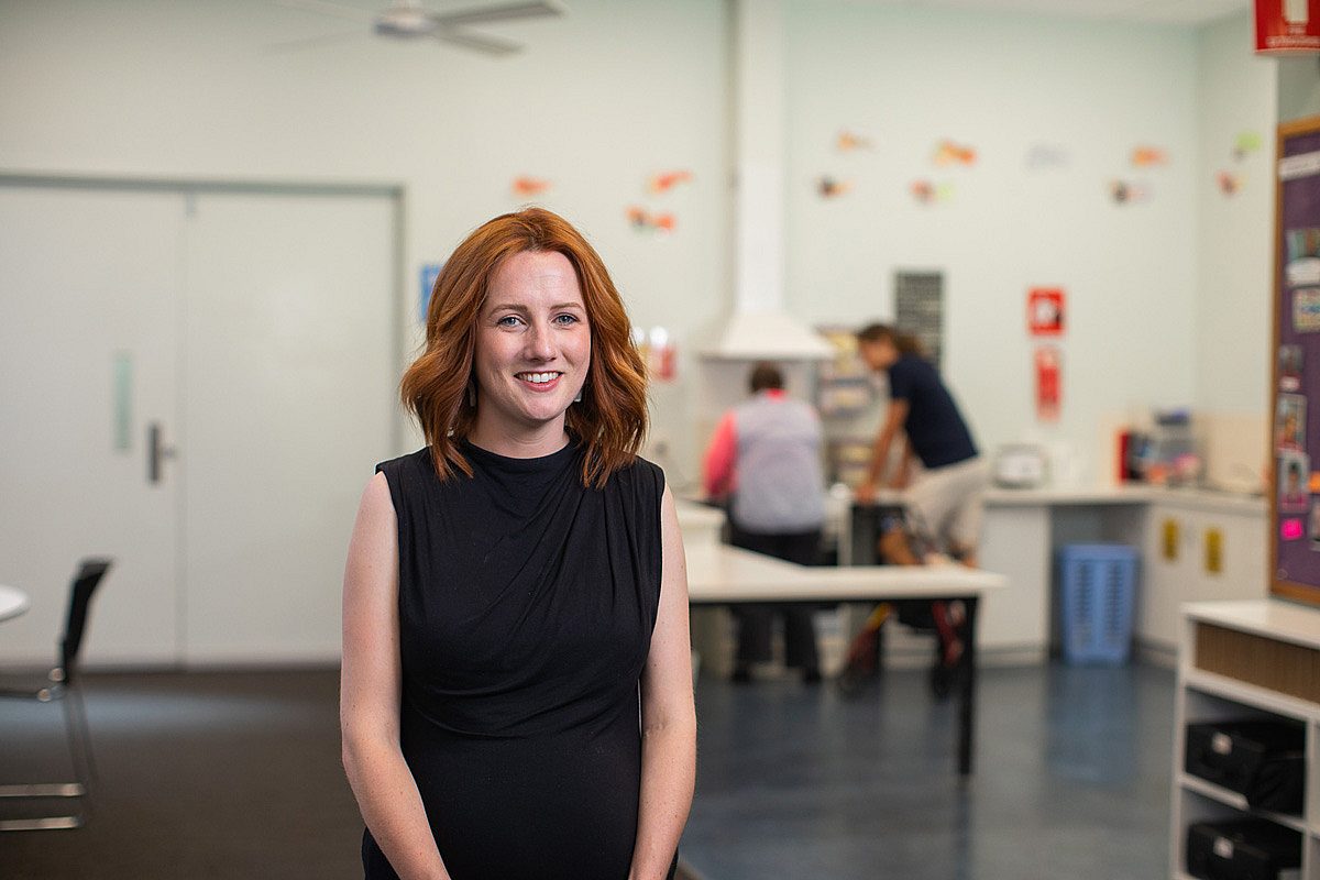 Young female care worker in a community setting