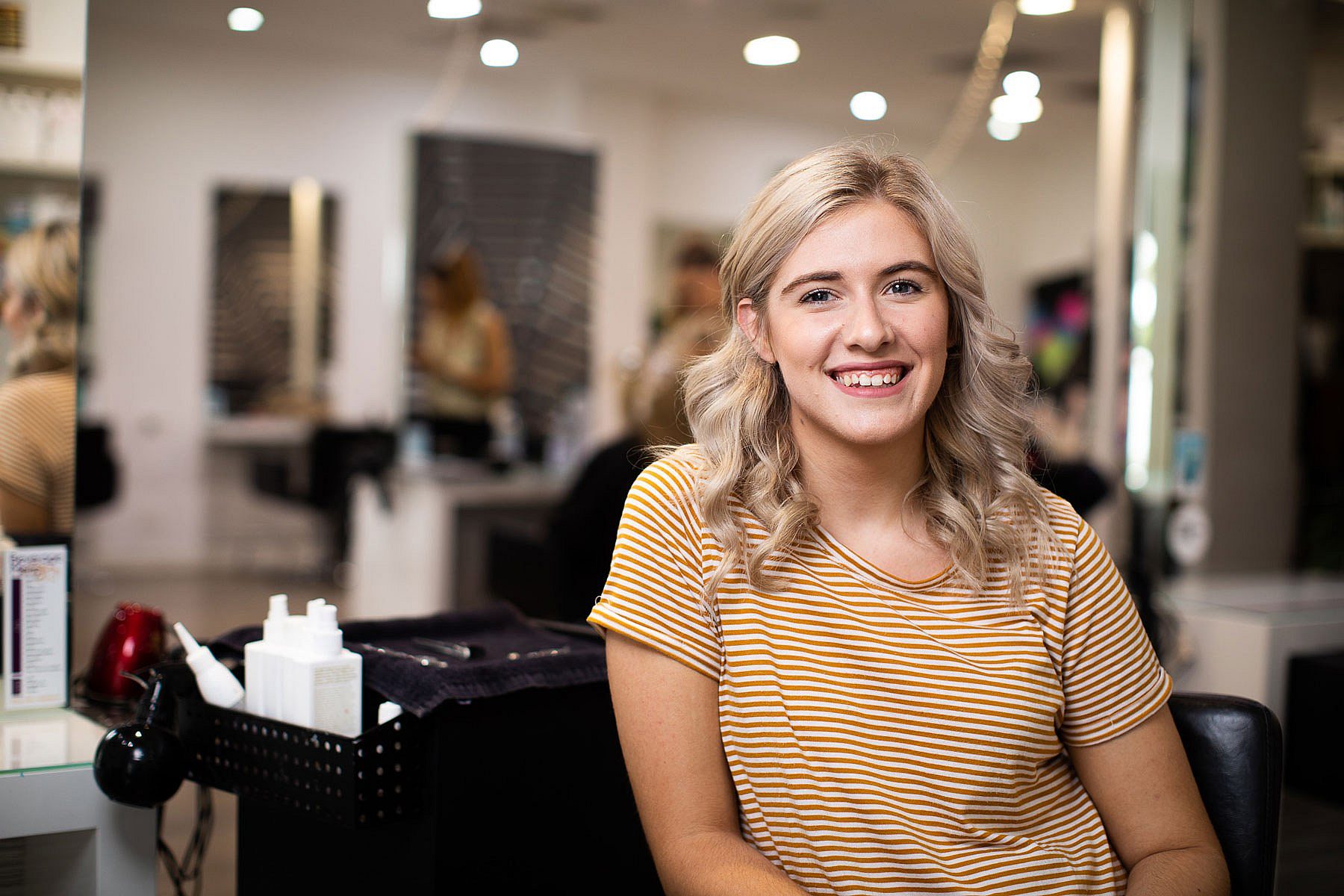 Apprentice hairdresser at a hair salon in South Australia