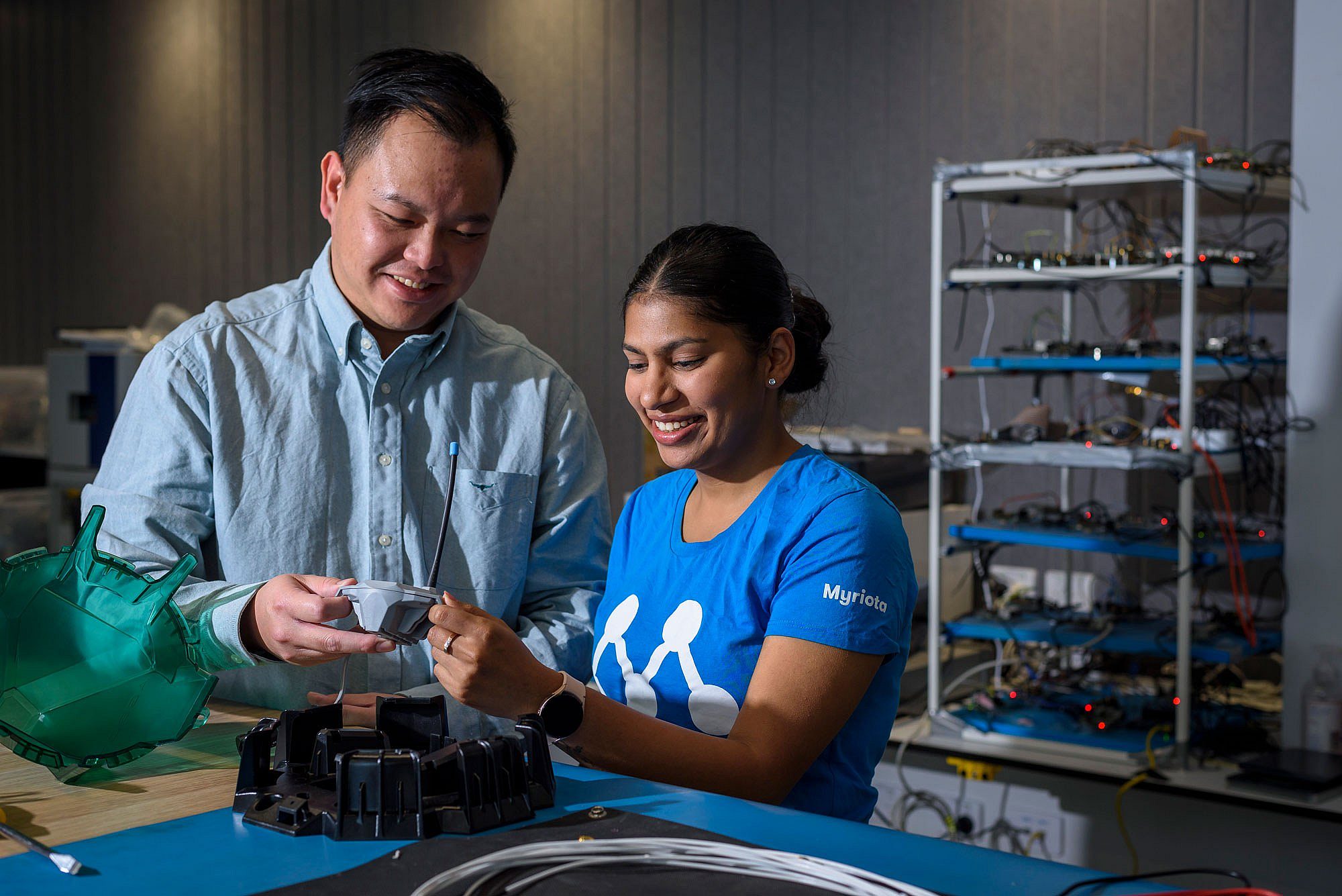 Male and female defence workers in manufacturing technology setting