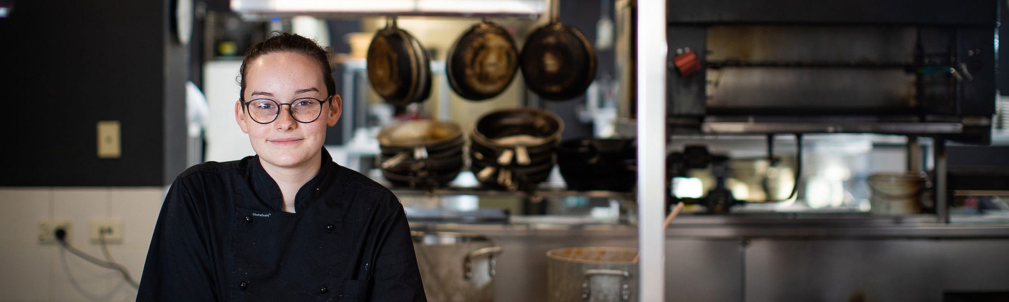 Apprentice chef in a hospitality setting